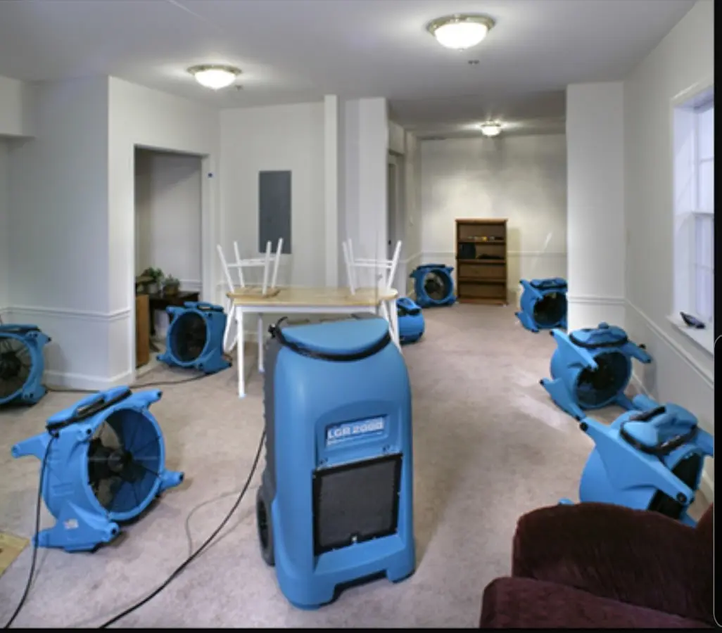 Air movers and dehumidifier setup for Water Damage Restoration in Hickam Housing