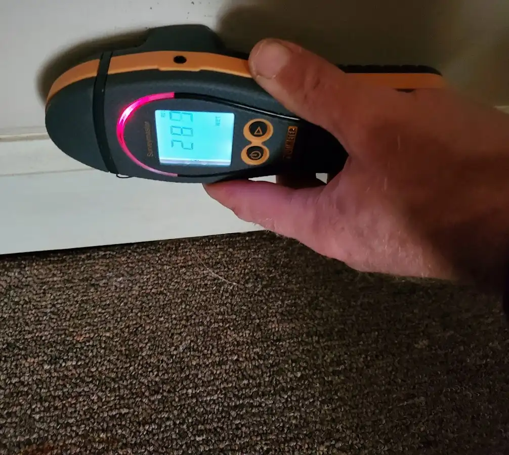 Moisture detection at baseboard during Mold Inspection & Testing in Hickam Housing